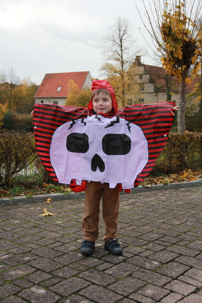 Regenponcho Regenschutz Regencape Kinderponcho Totenkopf Regenmantel Halloween